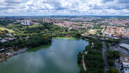 Fototapeta na wymiar Aerial view of Taquaral park in Campinas, São Paulo. In the background, the neighborhood of Cambui.