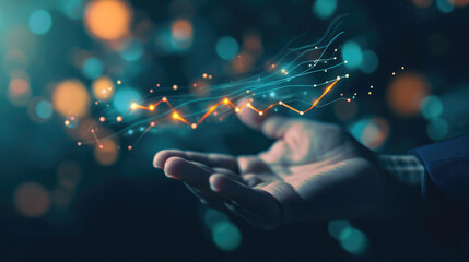 Hand with a digital holographic projection of financial stock market data, with glowing graphs, lines, and numbers against a bokeh light background.