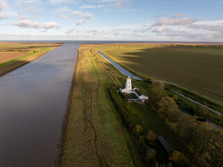 Sir Peter Scott Lighthouse, known as the East Lighthouse, River Nene, Sutton Bridge village, South...