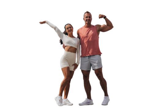 Energetic fitness duo flexing muscles and posing joyfully on a black background