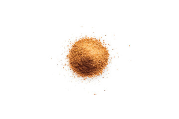 Closeup of a pile of raw organic ground cinnamon isolated on a transparent background with shadows...