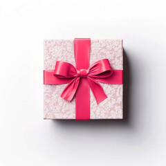 Gift or present box with red ribbon on table top view. Valentine day festive background. Flat lay