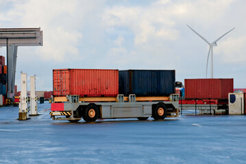 Remotely Operated Container Carrier Powered By Magnetic Fields Surface Underneath In The Modern Progressive European Port