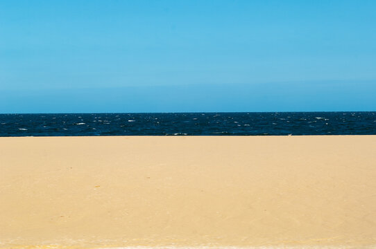 Wild, untouched beach with ocean and sky in Uruguay