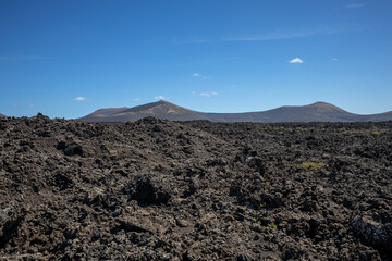 Volcanic soil and a mountain, Lanzarote, Spain
