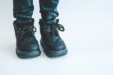 Stylish fashionable black children's shoes, close-up