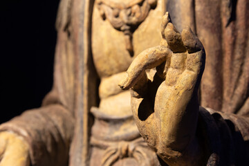 Fototapeta na wymiar Ancient Buddha hand. Concept of energy, ethnic, harmony, meditation, peace.