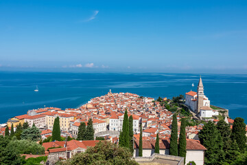 Panoramic aerial view of coastal town Piran, Primorska, Slovenia, Europe. Shimmering azure waters...