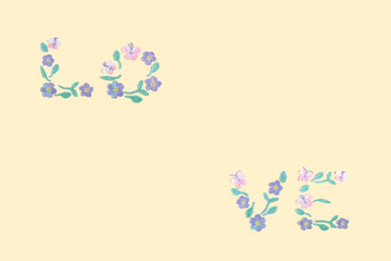 The concept of the love. Crocheted flowers are laid out in the shape of word LOVE. Valentines day. Springtime