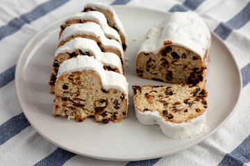 Homemade Christmas Stollen Bread on a Plate, side view.