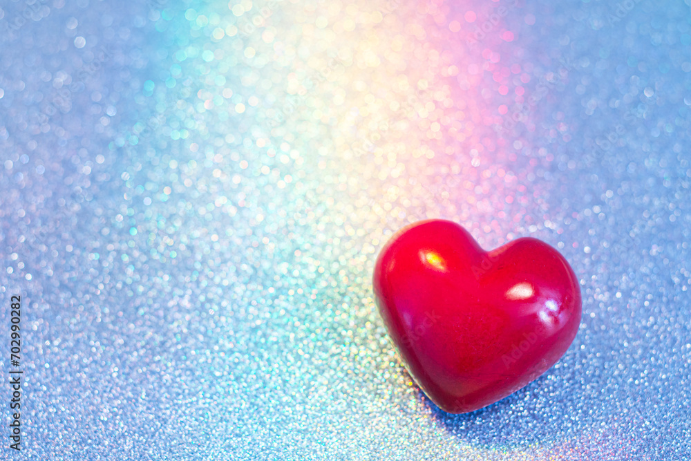 Wall mural a red heart on rainbow glitter with copy space. valentine's day background