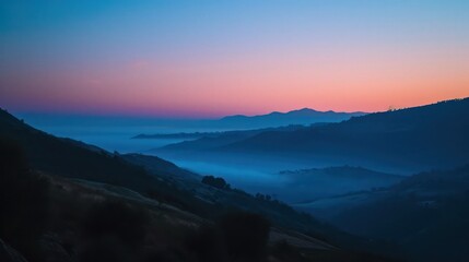 Fototapeta premium The stunning sunrise during the blue hour unveils a serene atmosphere, with the sky adorned in beautiful shades of blue and purple. 