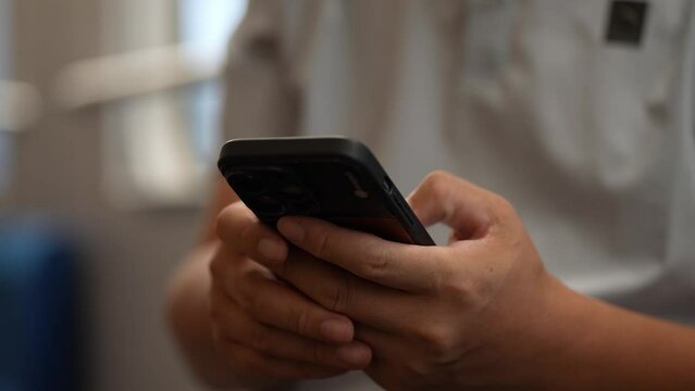 people using mobile phone on train