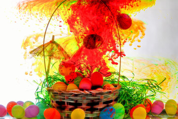 Obraz na płótnie Canvas Easter basket with red and yellow cloud coming into basket