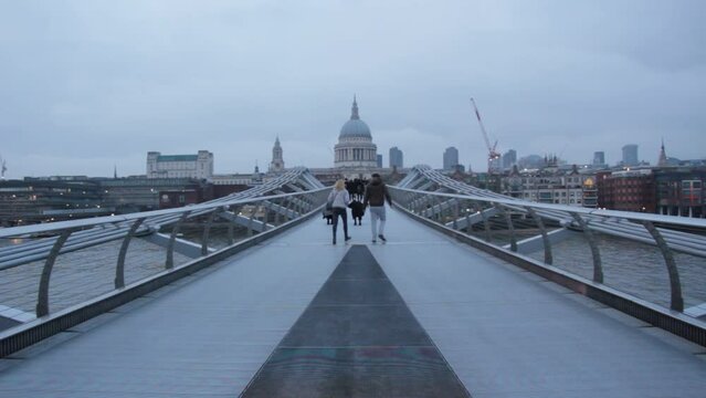 millenium bridge and St.Pauls cathedral skyline view across the Thames river, London uk  stock, footage, video, clip