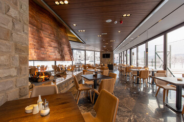 Interior of a modern mountain restaurant in the winter