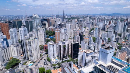 Fototapeta premium Aerial view of Avenida Paulista in Sao Paulo, Brazil. Very famous avenue in the city. High-rise commercial buildings and many residential buildings