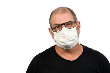 Portrait of a man, in a medical mask using alcohol gel. A concept of the danger of COVID-19 coronavirus for the elderly. on white background with space for text