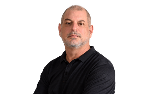 bald adult man showing cell phone handset technology edition "S3niorLife"