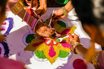 Indian Punjabi pre wedding Maiyan ceremony ritual mosaic close up