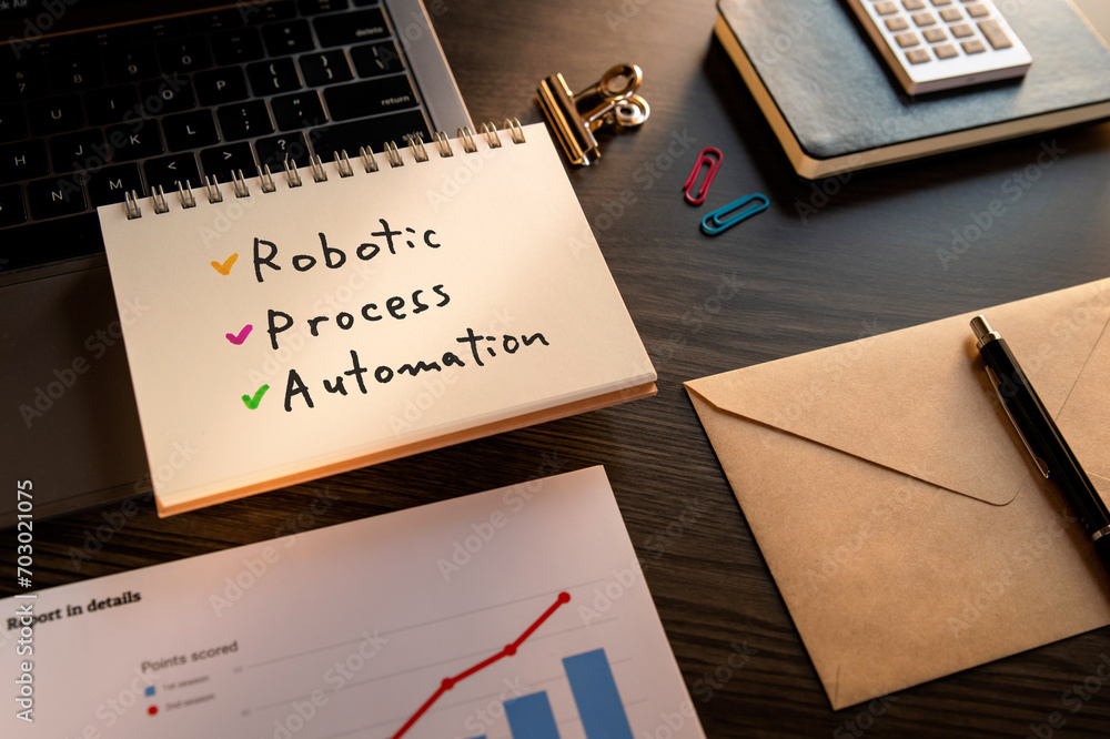 Poster there is notebook with the word robotic process automation. it is as an eye-catching image.