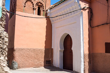 Entrance gate of an old mosque in the medina of Marrakesh, Morocco, North Africa