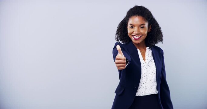 Black woman, hand gesture and face in studio for vote, change or choice conflict on grey background. Thumbs up, down and portrait of female entrepreneur with business rating, review or emoji opinion
