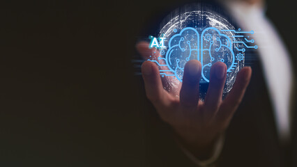 Ai technology concept, Artificial Intelligence, Digital technology, A Businessman holding digital brain in virtual global hologram on his hand to command.