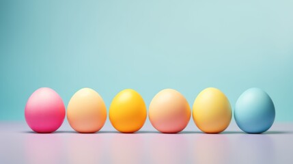 Easter painted colorful eggs in row on light blue green gradient background. Banner with copy space. Ideal for Easter promotions, spring events, holiday greetings, advertisements, festive content.