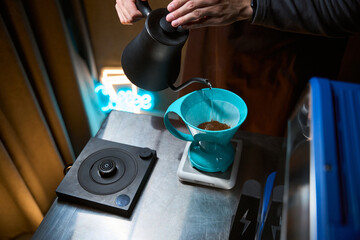 Barista using alternative ways of brewing coffee
