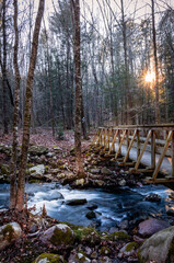 Stokes State Forest in Sussex County, NJ, a footbridge over Flatbrook on the Blue Mountain Trail in on a late afternoon in early winter