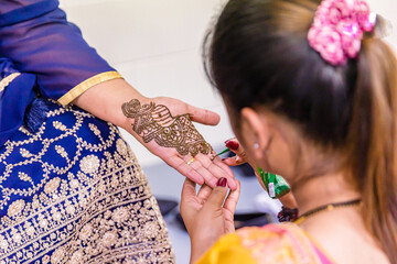 Indian bride's wedding henna mehendi mehndi hands close up