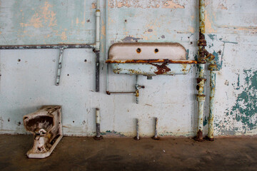 Vintage Alcatraz bathroom in an abandoned building 