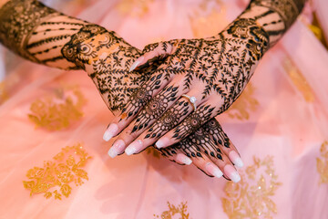 Indian bride's wedding henna mehendi mehndi hands close up