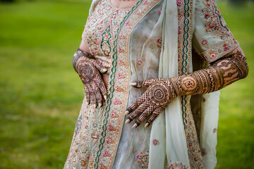 Indian bride's wedding henna mehendi mehndi hands close up