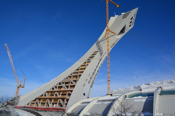 Under repair the Montreal Olympic Stadium  tower. It's the tallest inclined tower in the world.Tour...