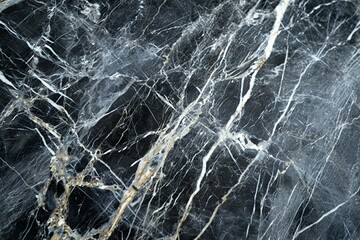 Glossy grey marble with white streaks, like a stormy sky.