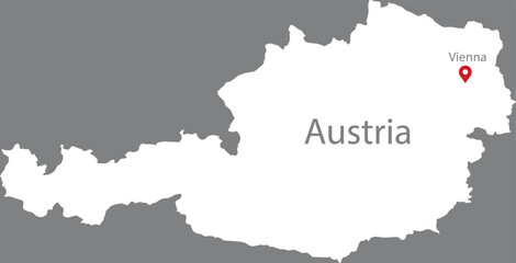 Fototapeta premium White Map of Austria with location marker of the capital and inscription of the name of the country and the capital inside map on gray background