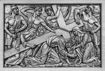 The Carrying of the Cross – Fourth Sorrowful Mystery. A relief sculpture in the Basilica of Our Lady of the Rosary of Fatima. 10 Aug 2023.