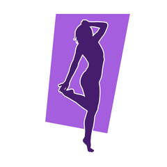 Silhouette of a slim female in dance pose. Silhouette of a woman dancing.