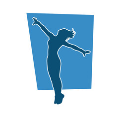 Silhouette of a slim female in dance pose. Silhouette of a woman dancing.