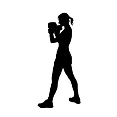 Silhouette of woman boxing athlete in action pose. Silhouette of a female wearing boxing gloves for boxing sport.