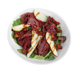 Delicious bresaola salad with sun-dried tomatoes, pear and balsamic vinegar in bowl isolated on white, top view