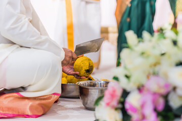 Obraz na płótnie Canvas Indian Hindu wedding ceremony rituals hands close up