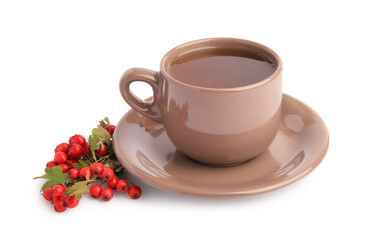 Aromatic hawthorn tea in cup and berries isolated on white