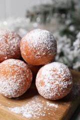 Delicious sweet buns on table against blurred background, closeup