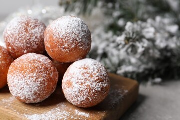 Delicious sweet buns on table against blurred background, closeup