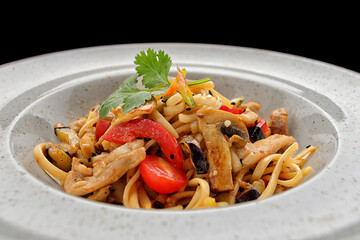Pasta with chicken, mushrooms and vegetables