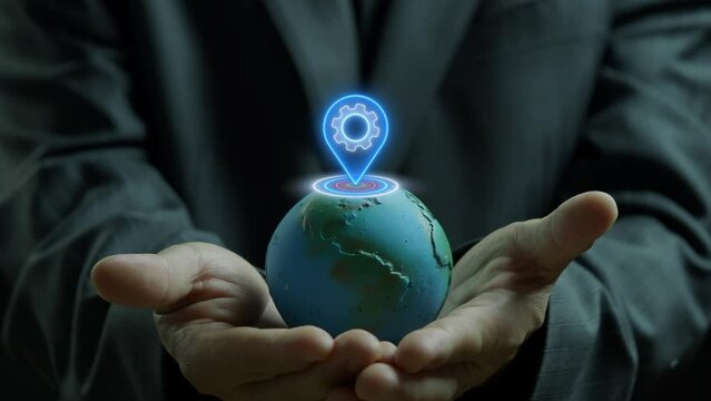 Professional businessman or investor shows globe and pin point location marker symbol on his palm. GPS and navigation, investment in residential property and real estate business concept.