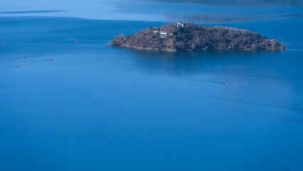 view of an island on a lake